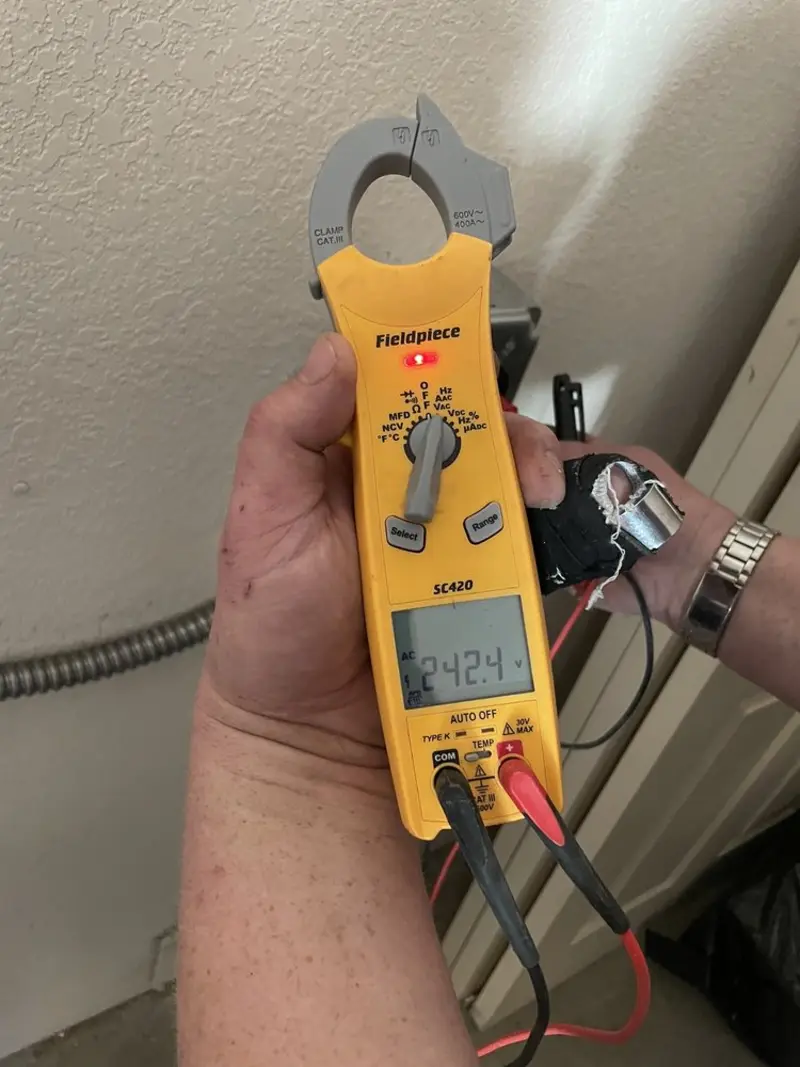 Voltage testing with clamp meter during Generator Installation in Wakefield